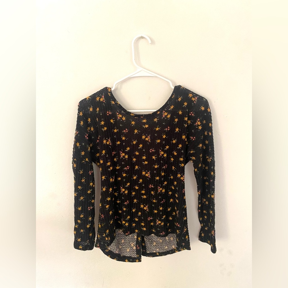 Floral waffle knit sweater with twist detailing on back